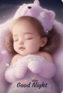 a baby is sleeping on a pillow with a teddy bear on its head .