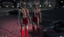 two women in red outfits are standing next to each other in a video game