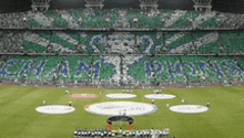 a soccer stadium with the word champions written on the stands