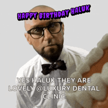 a man with glasses and a bow tie says happy birthday haluk yes haluk they are lovely @ luxury dental clinic