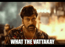 a man with a beard and mustache is asking what the vattakay .