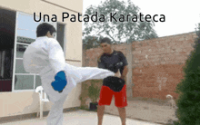 a man in a white karate uniform kicking another man in red shorts with the caption una patada karateca