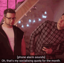 two men standing next to each other with one saying phone alarm sounds oh that 's my socialising quota for month