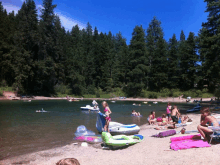 a group of people are playing in a lake