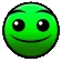 a green smiley face with black eyes and a smile on it .