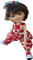 a doll is wearing a red and white floral outfit with converse shoes