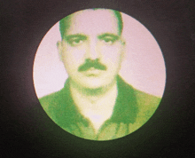 a man with a mustache is shown in a circle