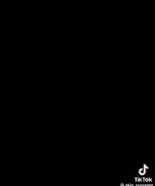 a tiktok video of a black background with a supreme logo on it .