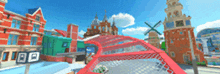 a blurred image of a city with buildings and a sign that says ' bb ' on it