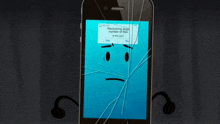 a cell phone with a broken screen and a message that says " recovering large number of files "