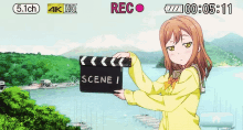 a girl is holding a clapper board that says scene 1 on it