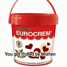 a red bucket of eurocrem ice cream with hearts on it .