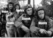 a black and white photo of a group of men and a dog with the names hugo ker bix zismek foxen and vanish