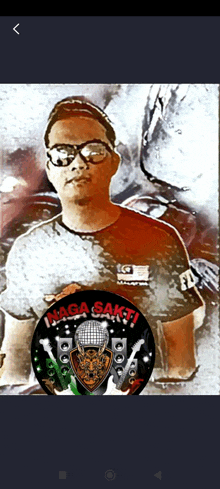 a man wearing glasses and a shirt that says naga sake on it