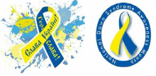 a blue and yellow ribbon with the words national down syndrome awareness month on it