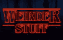 a sign that says weird stuff is lit up in red