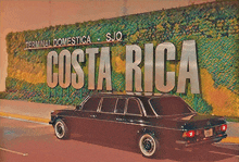 a car is parked in front of the costa rica terminal