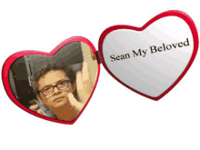 a heart shaped mirror says sean my beloved on it