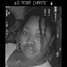 a black and white photo of a woman with the words d' atra chante on the top