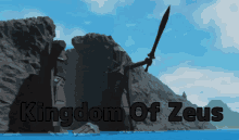 a poster for kingdom of zeus shows a statue holding a sword in front of a mountain