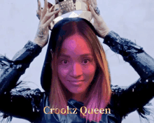 a woman with a crown on her head with the words crooks queen written below her