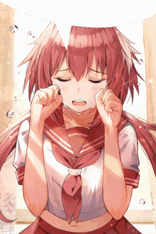 a girl with red hair is crying while wearing a sailor uniform