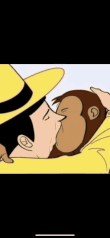 curious george is kissing a monkey on the cheek .