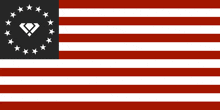 a red white and black american flag with a diamond in the center