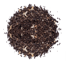 a pile of tea leaves with spices on a white background