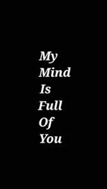 it says `` my mind is full of you '' in white letters on a black background .