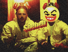 a man wearing a smiley face mask and the word shehen