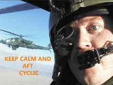 a man in a helmet looks at a helicopter with the words keep calm and aft cyclic below him