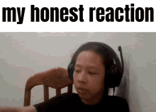 a picture of a person wearing headphones with the words my honest reaction below them