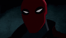 a close up of a cartoon character 's face wearing a red mask