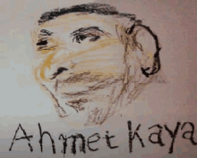 a drawing of a man 's face with the name ahmet kaya below it