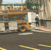 a man in a hat stands in front of a construction vehicle with the words " he boites bac obeazatelyo " written on it