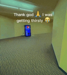 an empty hallway with a pepsi vending machine