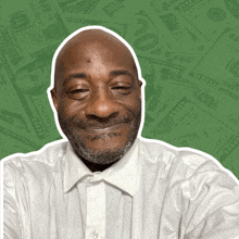 a man in a white shirt is smiling in front of a pile of money