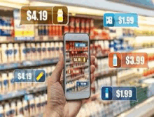 a person is holding a smart phone in front of a grocery store .