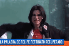 a woman holding a microphone with the words la palabra de felipe pettinato recuperado