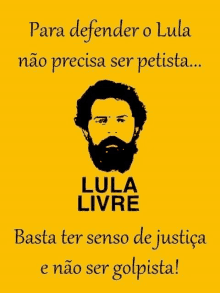 a yellow poster with a man with a beard and the words para defender o lula