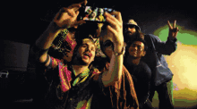 a group of people are taking a selfie together