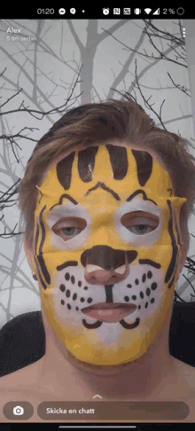 a man with a cheetah mask on his face is on alex 's phone