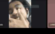 a blurred image of a person 's face with the words rectangular snip on the bottom left