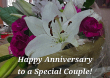 a bouquet of flowers with the words happy anniversary to a special couple written below it