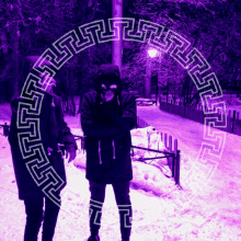 two people standing in the snow in front of a purple greek key design