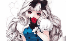 a girl with long white hair and red eyes is holding an apple in her hand .