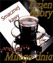 a cup of coffee sits on a saucer next to a piece of paper that says smaknej kawy