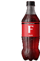 a bottle of coca cola has the letter f on the label