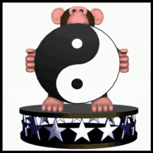 a monkey holding a black and white yin yang symbol on top of a drum with stars on it